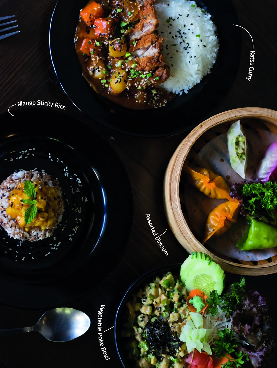 Overhead composition of Hashi dishes on a dark tabletop